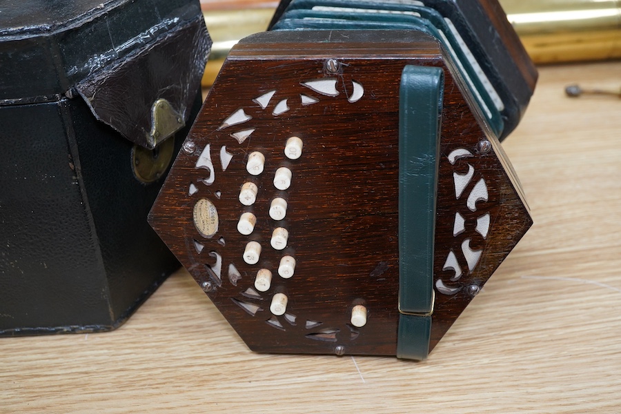 A leather cased mid-19th century Lachenal, London, 23 button concertina. Condition - fair to good, some wear to the case. The bellows appear sound and strong.